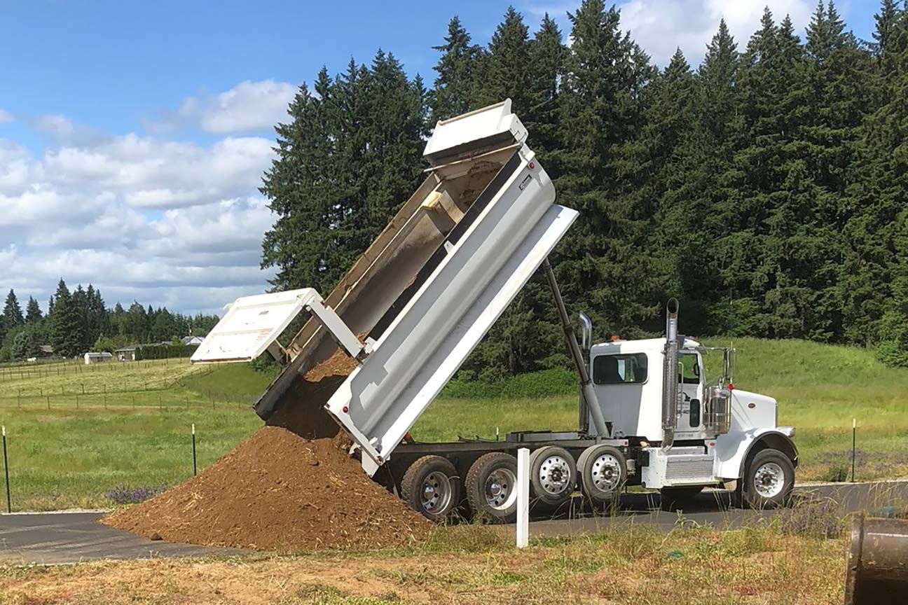 truck-dumping-dirt