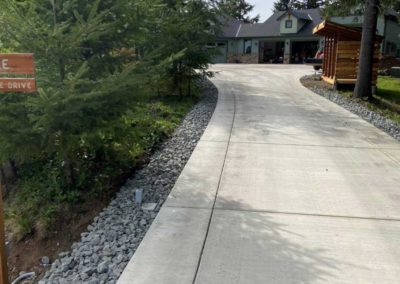 Cement driveway and gravel runoff